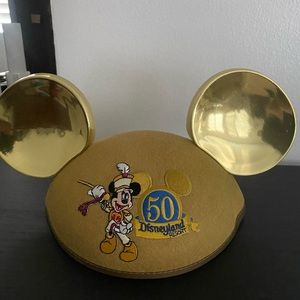 Gold Mickey 50th ears.